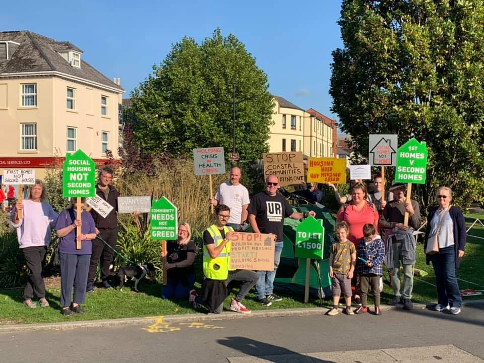 Community Housing Champions with signs